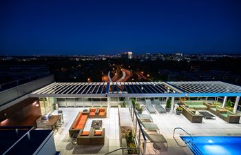 Outdoor Kitchen, Fireplace + Plush Lounge Seating at Verde Pointe, Arlington, 22201